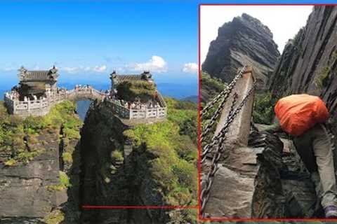 Fanjing Moutain, Visitors walk on the steep and narrow steps with holding iron chains to climb up